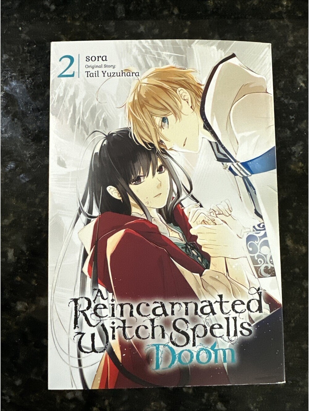 A Reincarnated Witch Spells Doom #2 (Yen Press 2023)